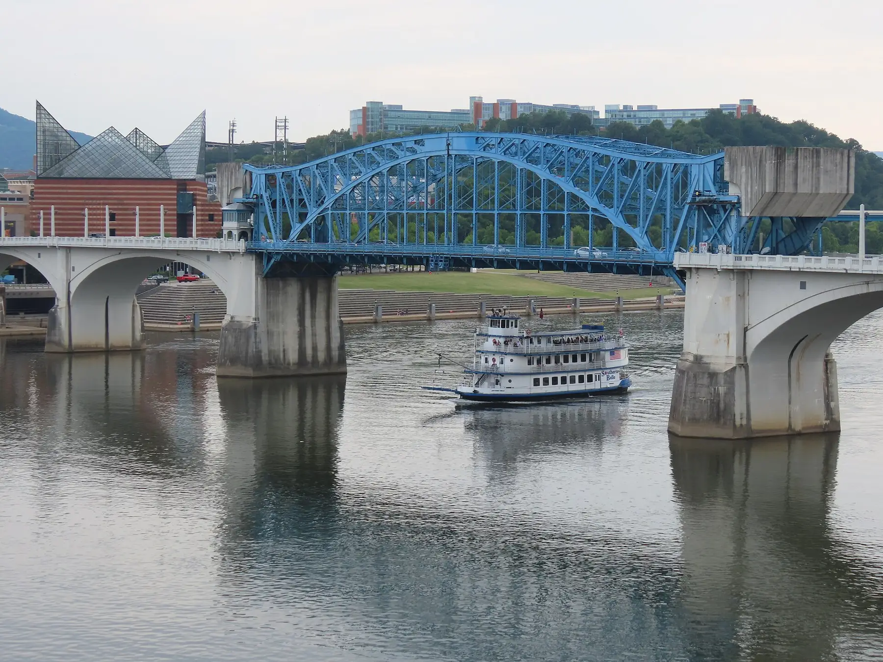 The Southern Belle riverboat passes under the Market Street Bridge on the Tennessee River in Chattanooga, seen from the Walnut Street Bridge.