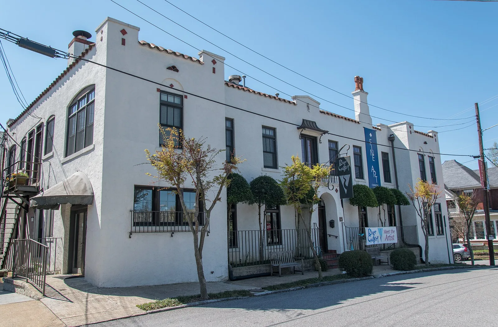 River Gallery's white stucco building in the Bluff View Art District above the Tennessee River in Chattanooga.