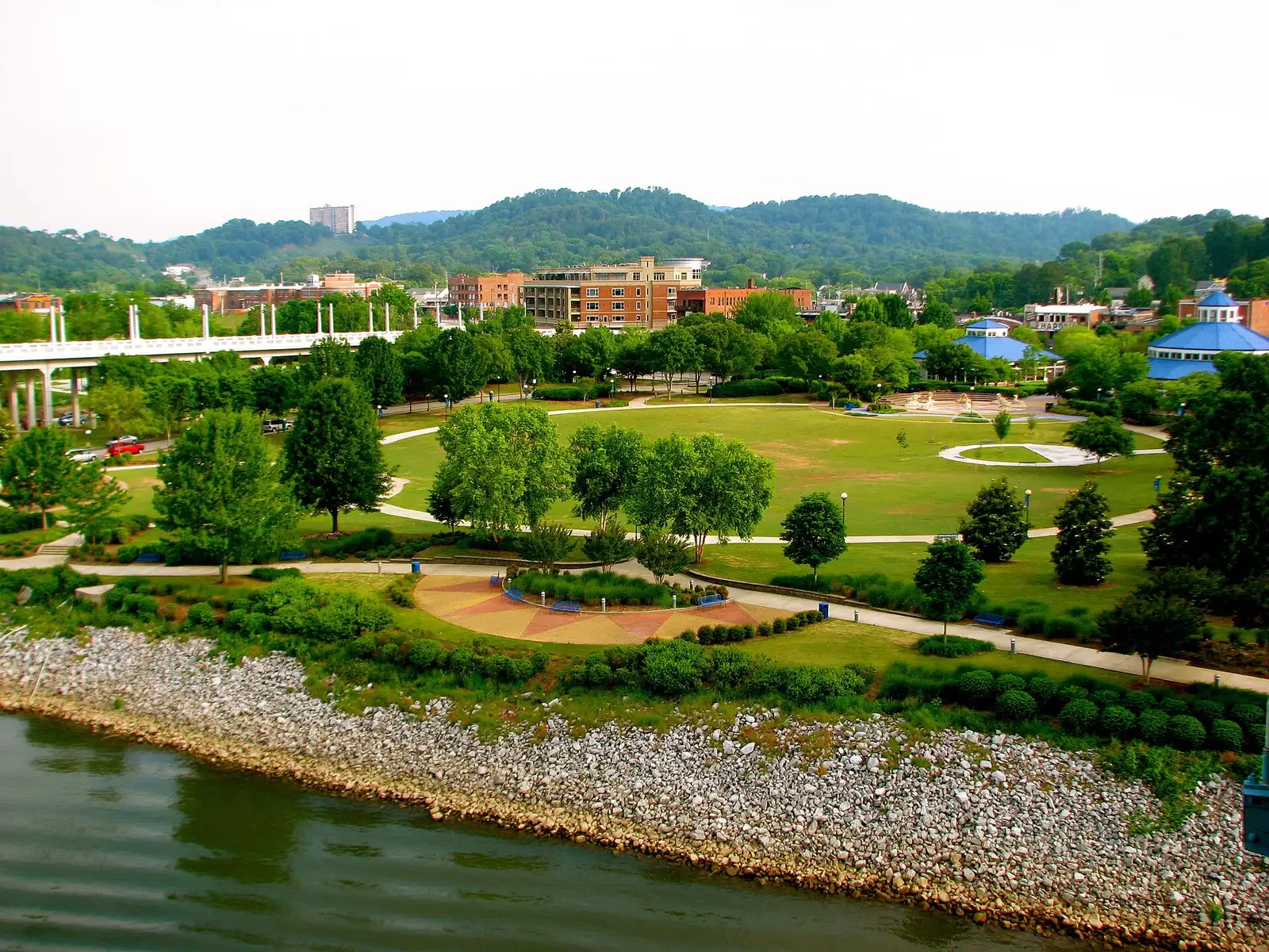 The lawns and riverfront paths of Coolidge Park on Chattanooga's North Shore, seen from the Walnut Street Bridge.