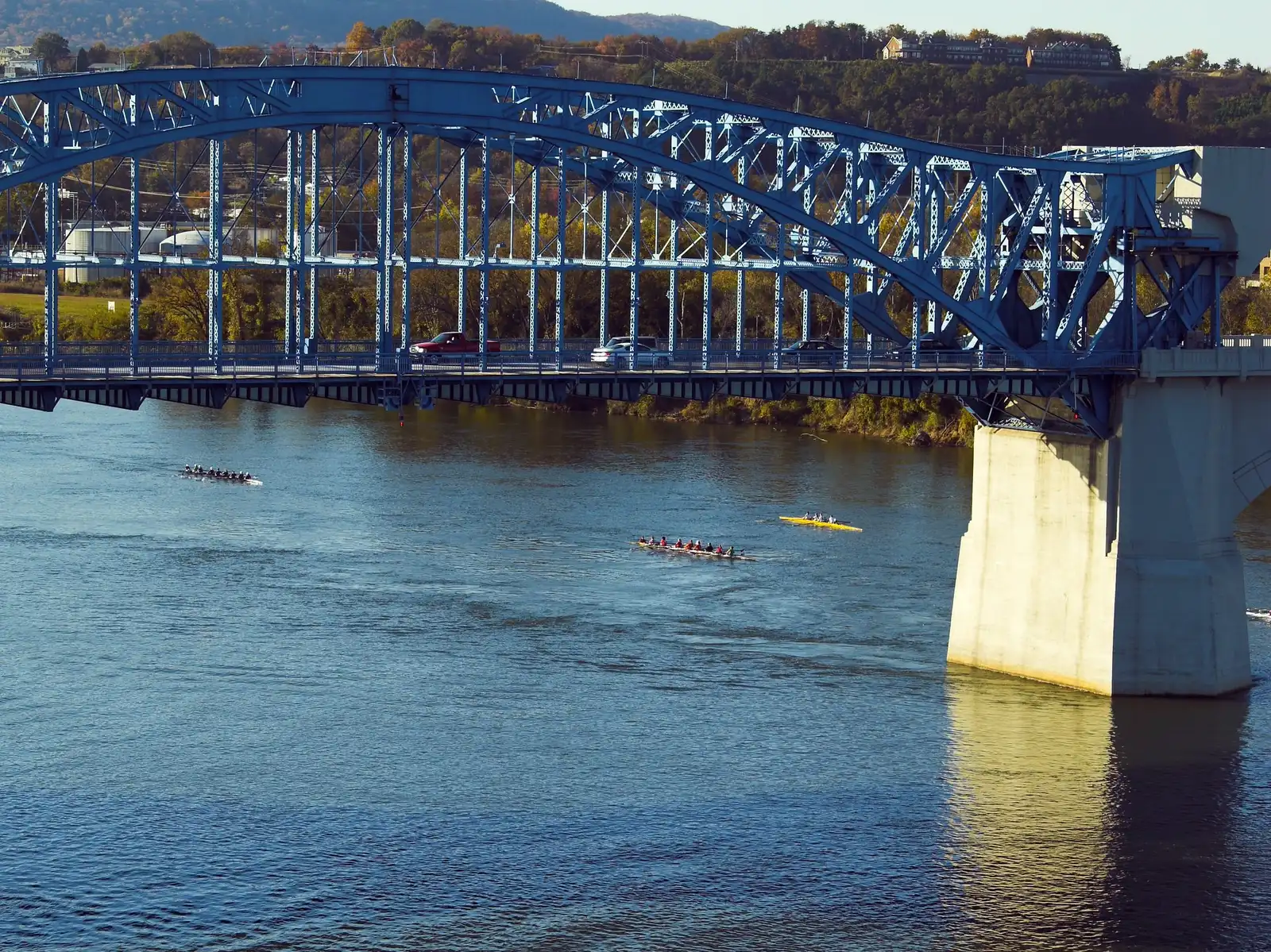 Rowing crews on the Tennessee River below the Market Street Bridge in downtown Chattanooga, photographed on a November regatta weekend.
