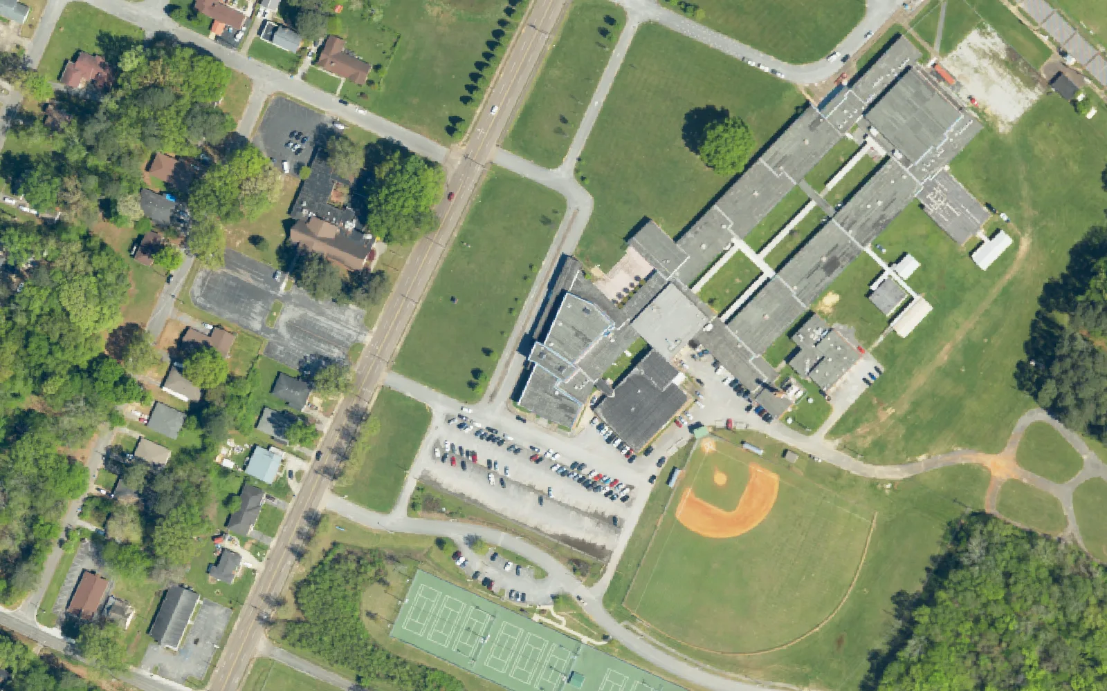Brainerd High School's campus on North Moore Road, with its baseball field and tennis courts, seen from the air.