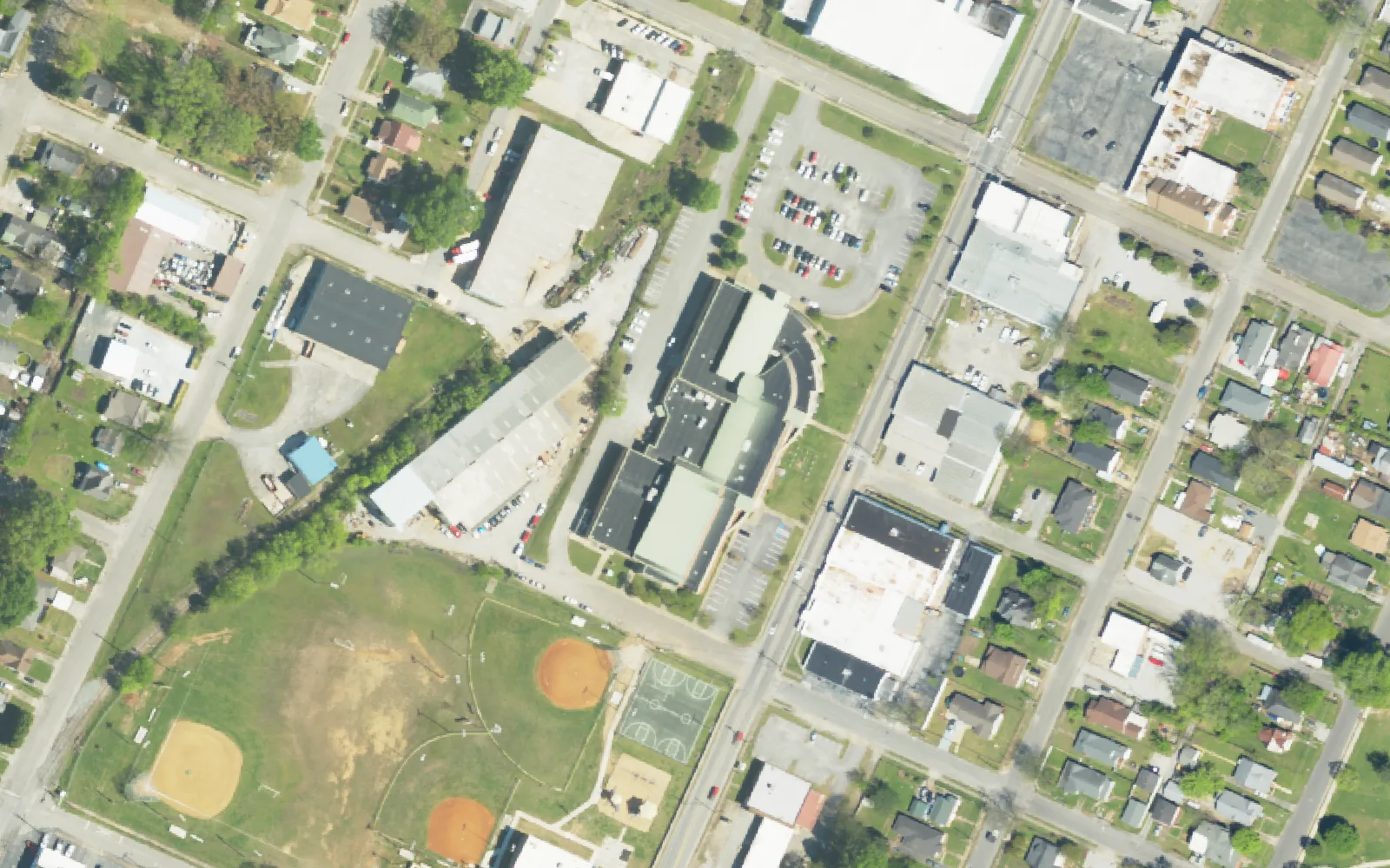 East Lake Academy of Fine Arts on East 34th Street and the ball fields beside it, seen from the air.