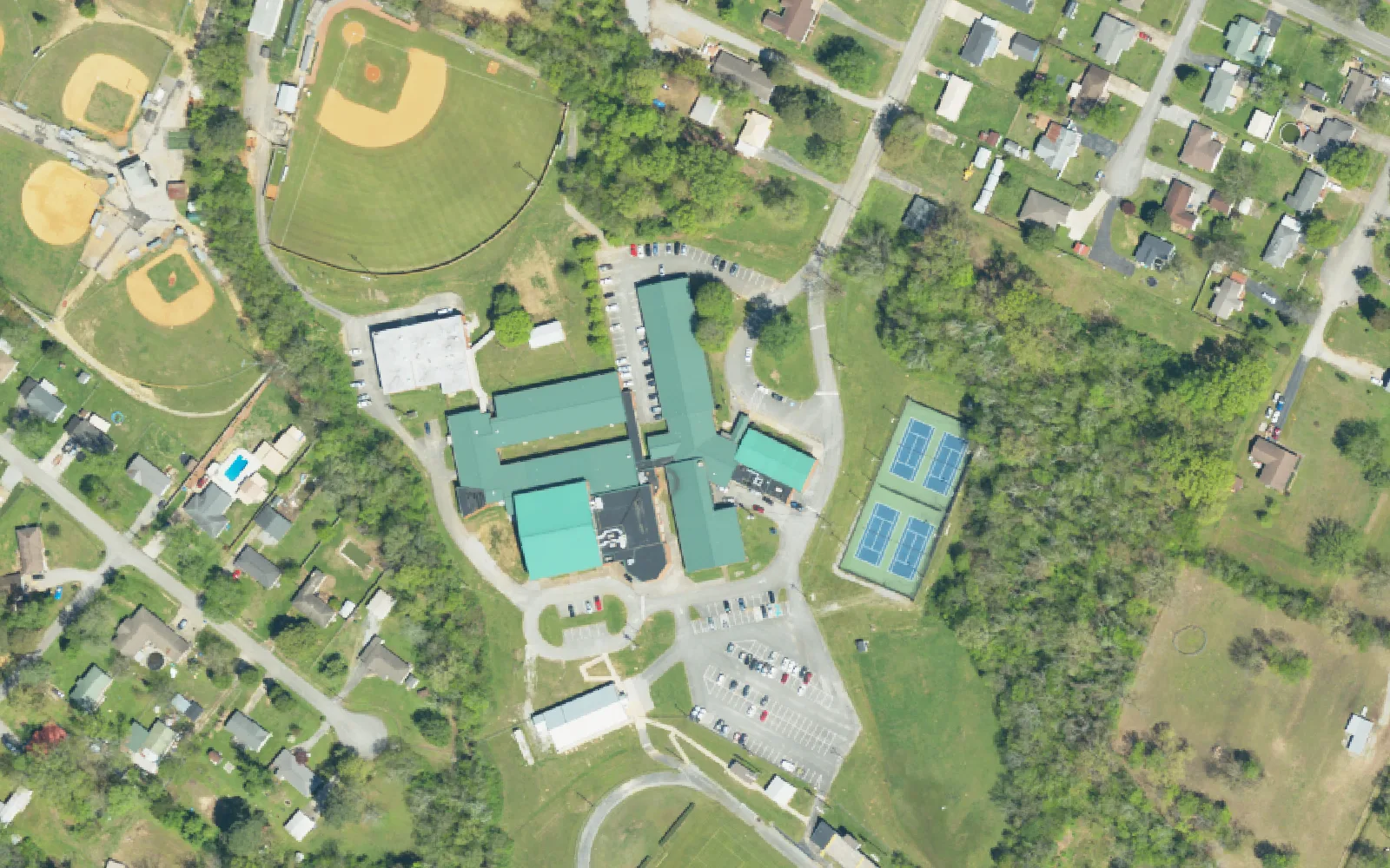 Lookout Valley Middle/High School in Lookout Valley, with its ball fields and tennis courts, seen from the air.
