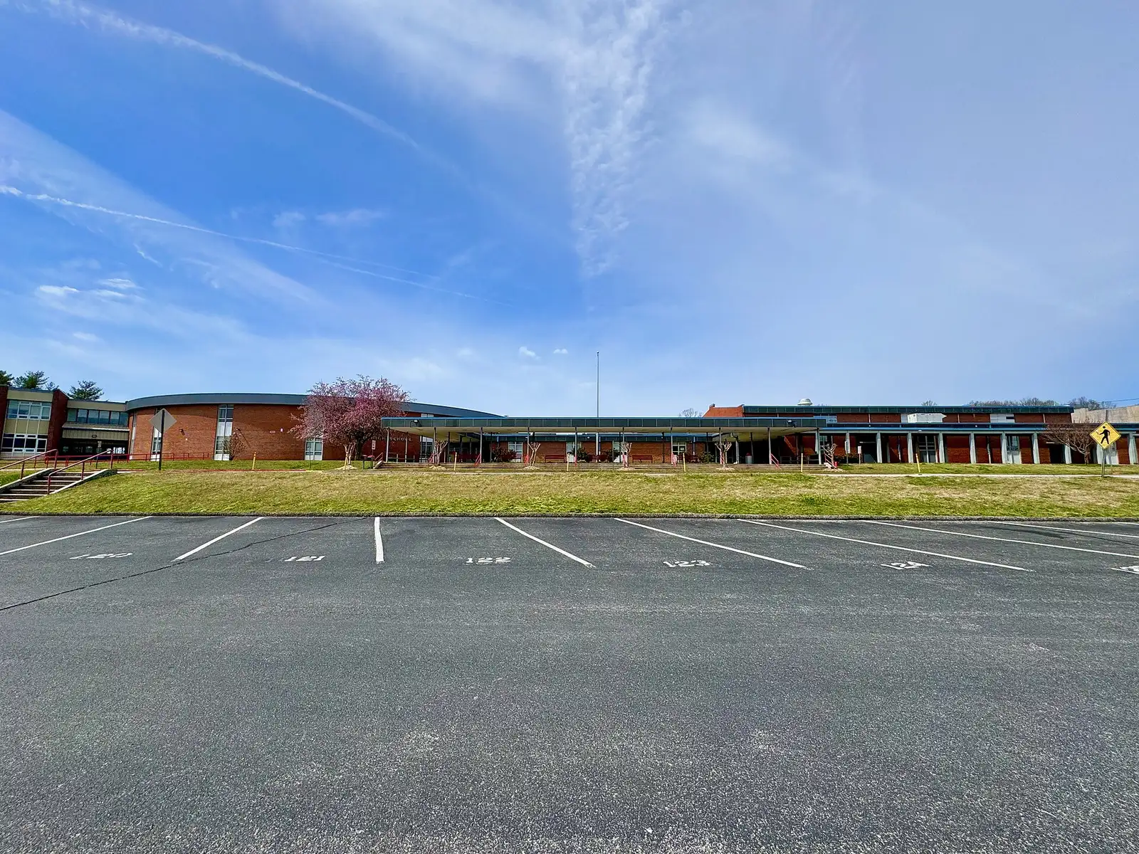 Ooltewah High School seen across its parking lot on Mountain View Road.